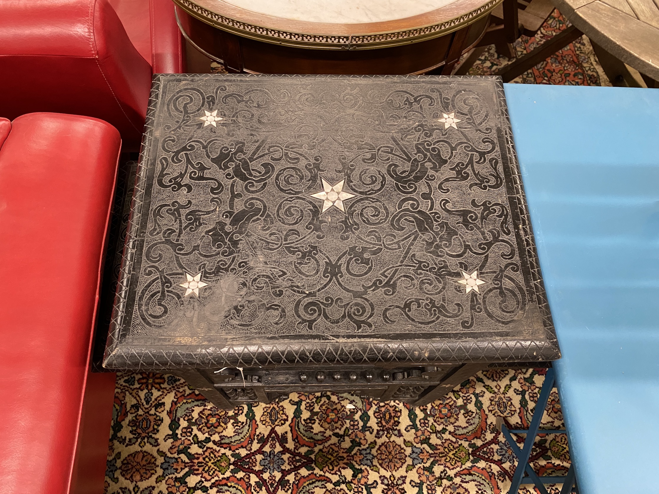 A Moorish ebonised and mother of pearl inlaid occasional table, width 76cm, depth 40cm, height 75cm